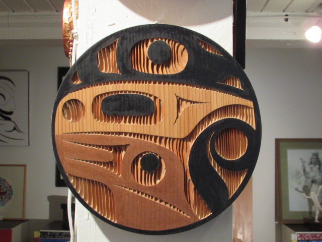 Raven Panel; 1' diameter; red cedar, acrylic
